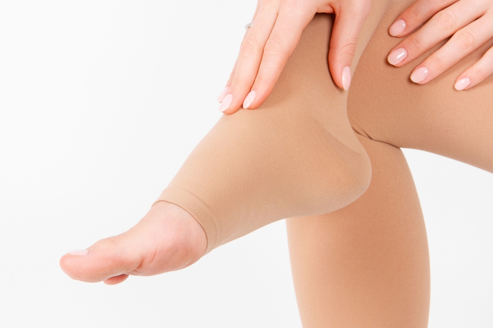 Legs wearing compression socks